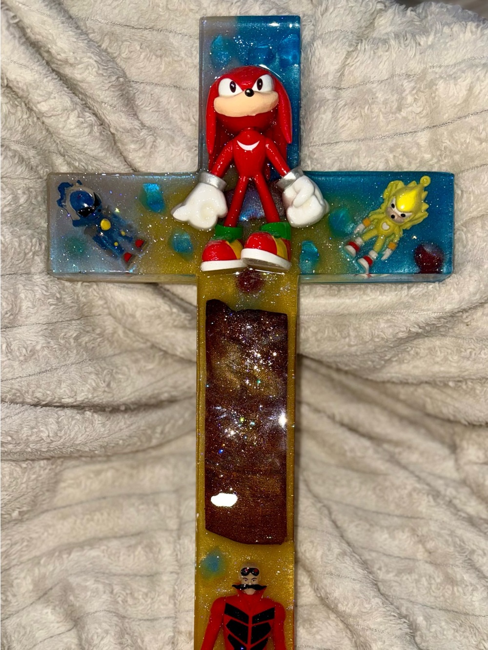 Knuckles Resin Wall Cross with Blue and Yellow Accents